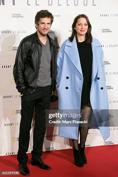 Director Guillaume Canet and actress Marion Cotillard attend the 'Before the Flood - Avant le Deluge' Premiere at Theatre du Chatelet on October 17,...