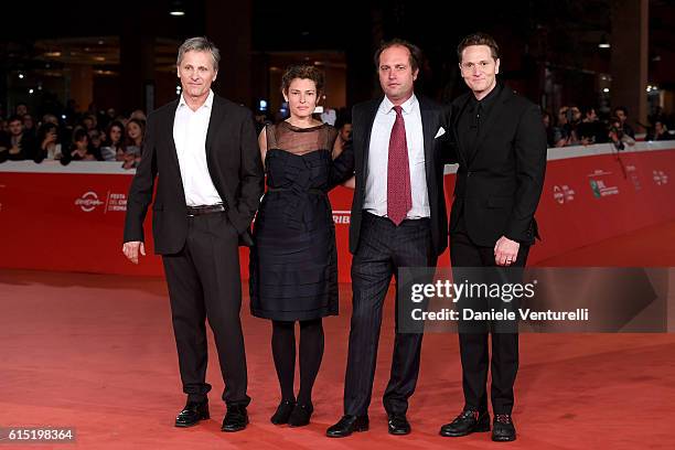 Viggo Mortensen, Ginevra Elkann, Francesco Melzi D'Eril and Matt Ross walk a red carpet for 'Captain Fantastic' during the 11th Rome Film Festival at...
