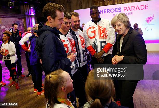 British Prime Minister Theresa May meets Ellie Simmonds, Ellie Robinson, Alistair Brownlee, Jonny Brownlee, Aled Davies and Lutalo Muhammad of Great...