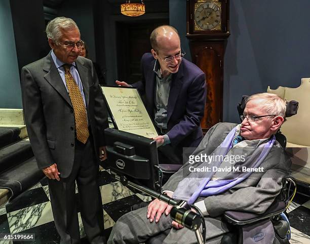 Arjun Waney, Jerome Gauntlett and Stephen Hawking attend a dinner at The Arts Club in honour of the Club presenting Professor Stephen Hawking with...