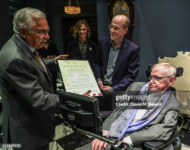 Arjun Waney, Jerome Gauntlett and Stephen Hawking attend a dinner at The Arts Club in honour of the Club presenting Professor Stephen Hawking with...