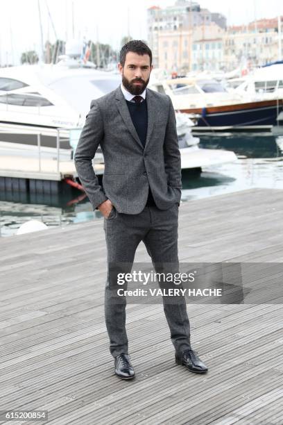 Welsh actor Tom Cullen poses for a photocall for the TV series "Knightfall" as part of the MIPCOM on October 17, 2016 in Cannes, southeastern France.