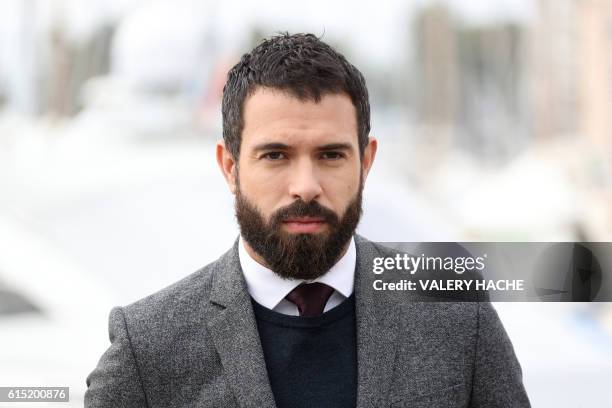 Welsh actor Tom Cullen poses for a photocall for the TV series "Knightfall" as part of the MIPCOM on October 17, 2016 in Cannes, southeastern France.