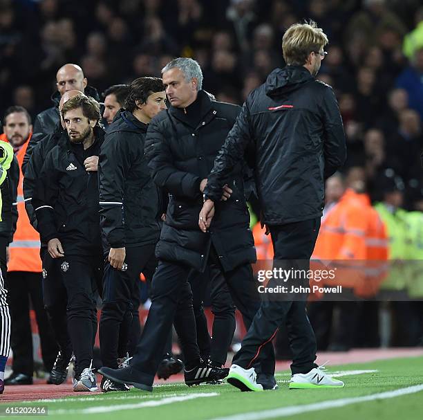 Jurgen Klopp Manager of Liverpool with Jose Mourinhio at the end of the Premier League match between Liverpool and Manchester United at Anfield on...