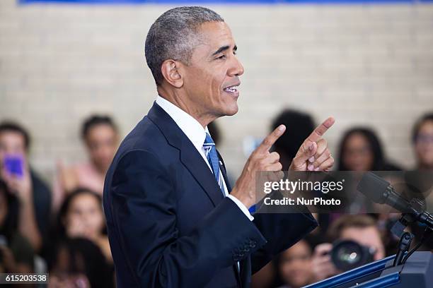 President Barack Obama delivers remarks on education at Benjamin Banneker Academic High School in Washington,DC on October 17, 2016.