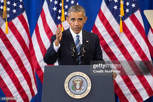 President Barack Obama delivers remarks on education at Benjamin Banneker Academic High School in Washington,DC on October 17, 2016.