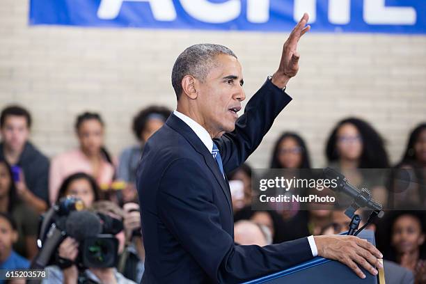 President Barack Obama waves after delivers remarks on education at Benjamin Banneker Academic High School in Washington, DC on October 17, 2016.