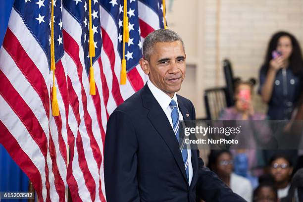 President Barack Obama delivers remarks on education at Benjamin Banneker Academic High School in Washington,DC on October 17, 2016.