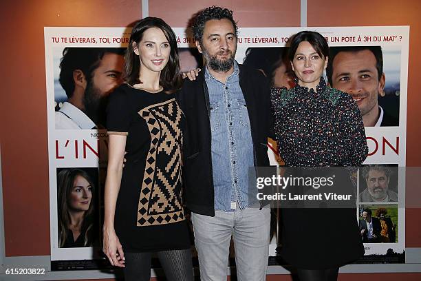 Frederique Bel, Nader Boussandel and Anne Charrier attend the "l'Invitation" Paris Premiere at UGC George V on October 17, 2016 in Paris, France.