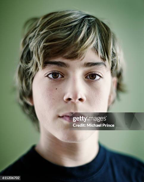 teenage boy - boy portrait studio stock pictures, royalty-free photos & images