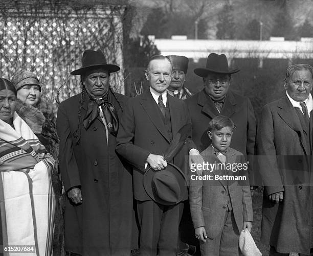 Osage Indians from Oklahoma called on President Coolidge at the White House where they discussed tribal matters through their Indian commissioner.