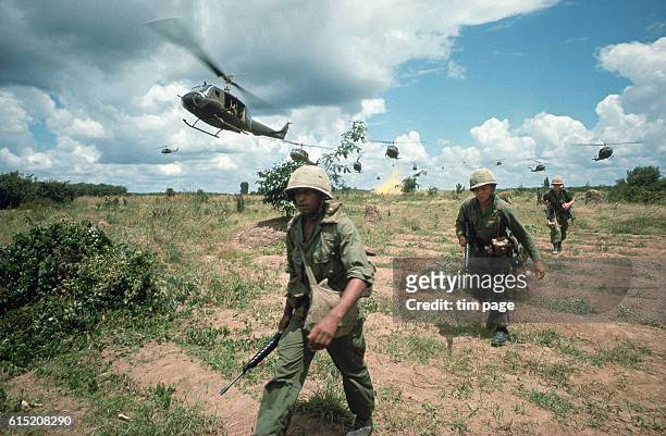 The US 173rd Airborne are supported by helicopters during the Iron Triangle assault.
