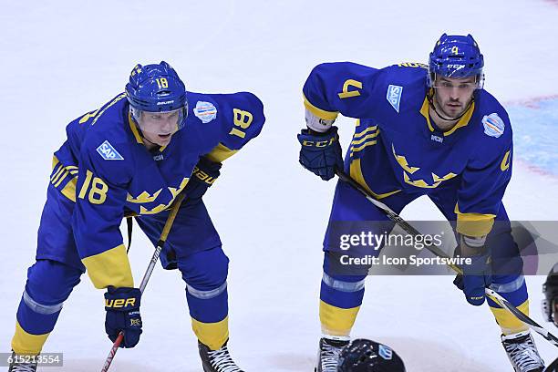 Team Sweden Forward Jakob Silfverberg and Team Sweden Defenceman Niklas Hjalmarsson in the face off circle during the WCOH semi final game between...