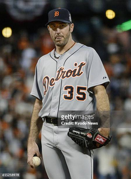 United States - Detroit Tigers starter Justin Verlander reacts after allowing a two-run homer by San Francisco infielder Pablo Sandoval during the...
