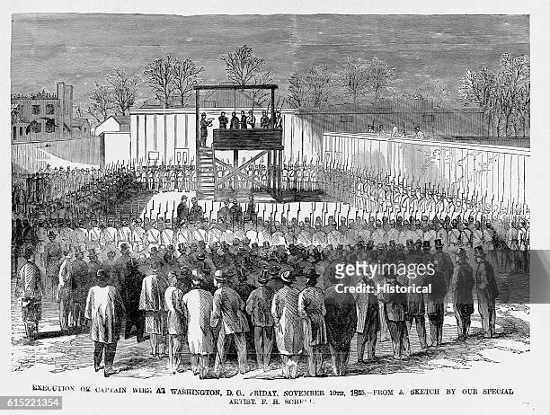 Large crowd of soldiers await the execution by hanging of Henry Wirz, the Confederate commandant of Andersonville prison camp, on November 10, 1865.