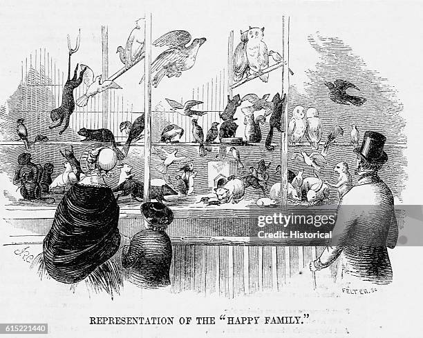 19th-century family at the "Happy Family" exhibit at P.T. Barnum's American Museum. The exhibit grouped several different animal species in a single...