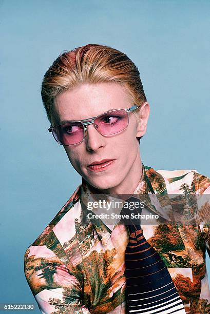David Bowie in pink sunglasses