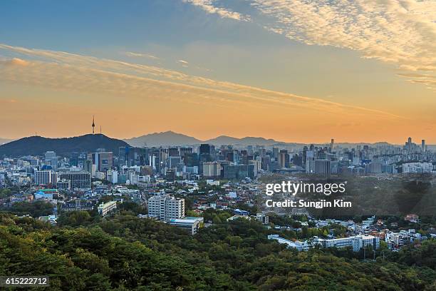 urban skyline of central seoul by sunset - namsan seoul stock pictures, royalty-free photos & images