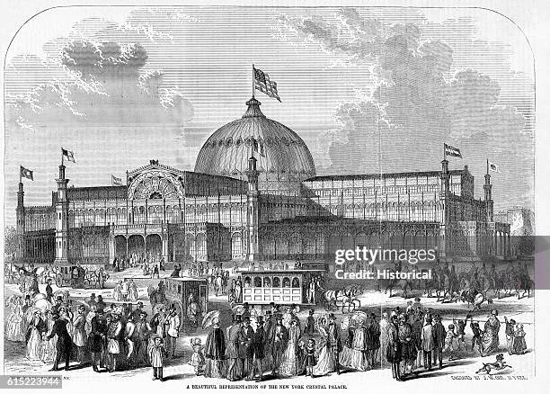 New Yorkers crowd the street outside the Crystal Palace during the 1853 World's Fair in New York. The building was modeled after the original Crystal...