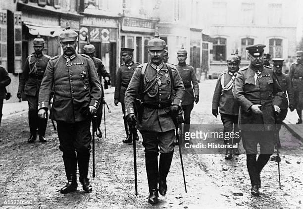 German emperor Wilhelm II marches with two of his generals, Hindenburg and Ludendorff, during World War I.
