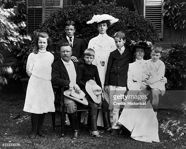 Portrait of Theodore Roosevelt with his family in 1903, prior to his election to President in 1904. His oldest daughter Alice stands at the rear. He...