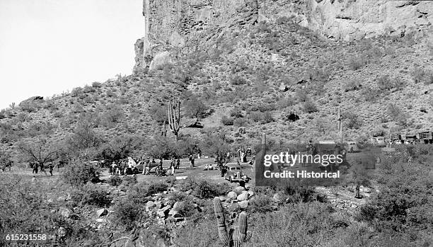 Cars dot a temporary base camp of the Dons Club annual trek in search of the Lost Dutchman Gold Mine in the Superstition Mountains. Peralta Canyon,...