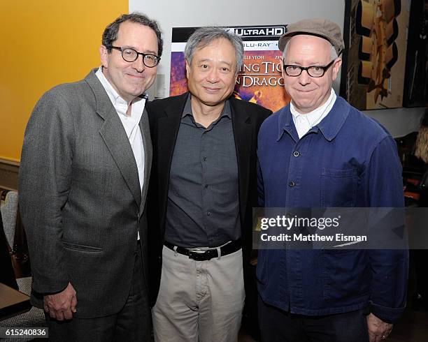 Co-President and Co-Founder of Sony Pictures Classics Michael Barker, director Ang Lee and screenwriter James Schamus pose together for a photo at...