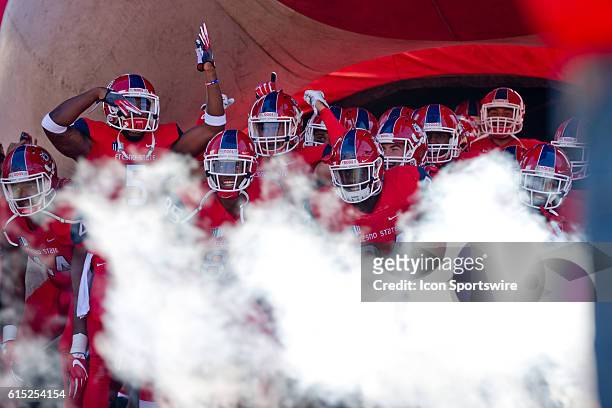 Fresno State gets ready to take the field before the game between the Fresno State Bulldogs and the Tulsa Golden Hurricane at Bulldog Stadium in...