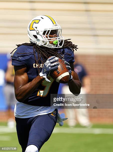 Chattanooga Mocs wide receiver Alphonso Stewart looks to pass the ball on a reverse play during the game between Samford and UT Chattanooga....