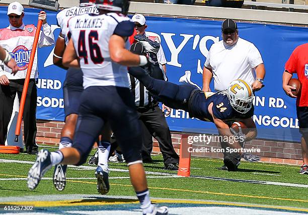 Chattanooga Mocs running back Derrick Craine dives into the end zone during the game between Samford and UT Chattanooga. Chattanooga defeats Samford...