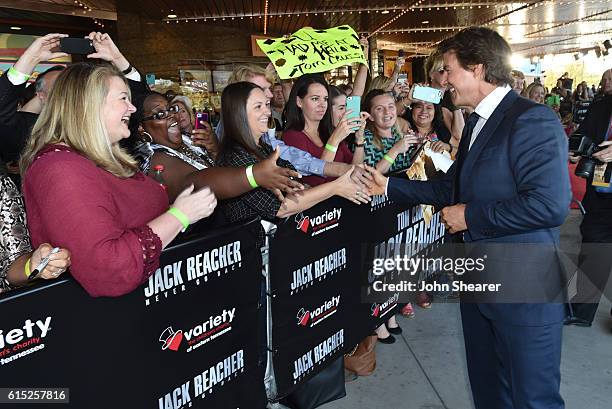 Actor Tom Cruise greets fans on the red carpet at the "Jack Reacher: Never Go Back" Tennessee Benefit Screening for Variety - The Children's Charity,...