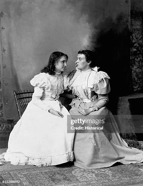 Helen Keller reads the lips of her teacher, Anne Sullivan . Keller, left blind and deaf by scarlet fever at the age of two, learned sign and speech...