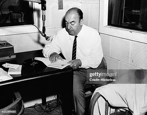 Pablo Neruda reads from his poetry during a radio interview. Neruda, a poet and diplomat, was awarded the Nobel prize for Literature in 1971.