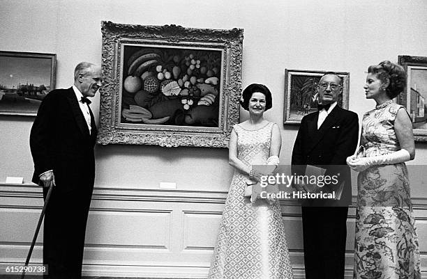 Lady Bird Johnson at the National Gallery with Paul Mellon and his wife, about 1965.