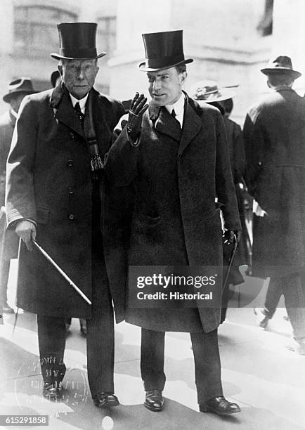 John D.Rockefeller and John D. Rockefeller, Jr. Walk together. Rockefeller and his son, Rockefeller, Jr. , were American industrialists and...