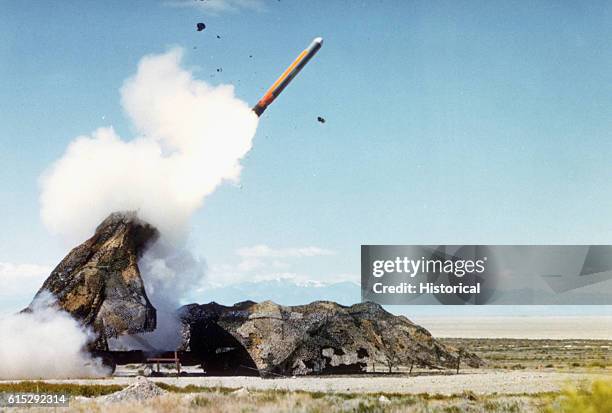 Ground-launched cruise missile is fired from its camouflaged transporter-erector-launcher during a test at the Dugway Range. From the February 1985...