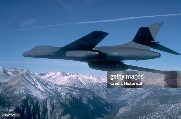 An air-to-air left side view of a B-1B bomber during an acceptance flight being conducted by Detachment 15 of the Air Force Contract Management...