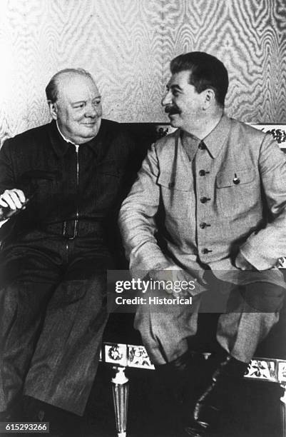 Joseph Stalin and Winston Churchill sit in the Kremlin in Moscow.
