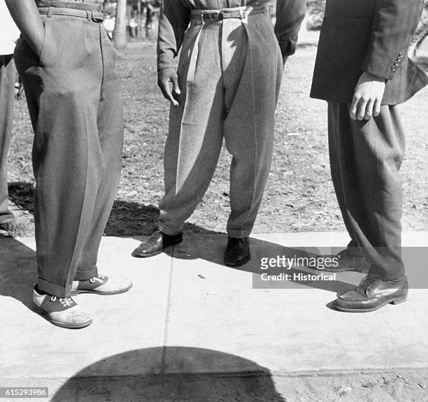 The male college students wear zoot suits about the campus of Bethune-Cookman College in Daytona Beach, Florida. January 1943. | Location:...