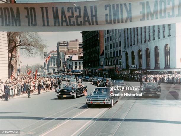 President John F. Kennedy and King Hassan II of Morocco in a motorcade during the King's visit to the United States.