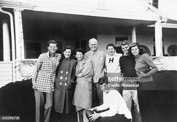 Kennedy family at Thanksgiving at Hyannisport, Massachusetts, 1948. From left: John F. Kennedy, Jean Ann Smith, Rose Kennedy, Joseph Kennedy Sr.,...