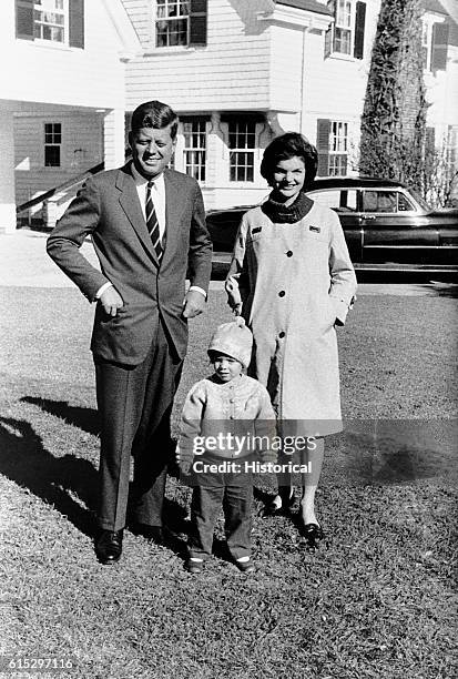 View of John F Kennedy and Jacqueline Kennedy, with their daughter Caroline, on election day, Hyannis Port, Massachusetts, November 8, 1960. On the...