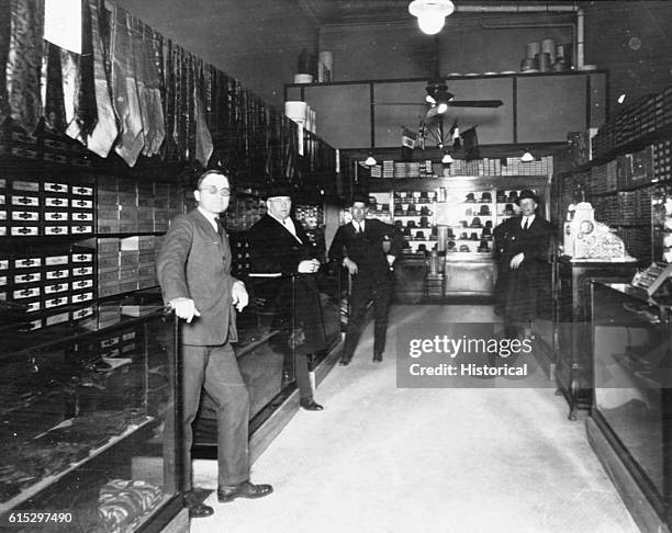 Harry S Truman, left, when he was the proprietor of a Kansas City, Missouri, haberdashery. The other gentlemen are, from left to right, Francis...