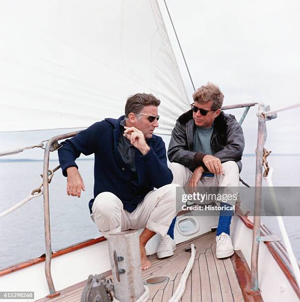 President Kennedy and his brother-in-law Peter Lawford aboard the United States Coast Guard yacht 'Manitou'