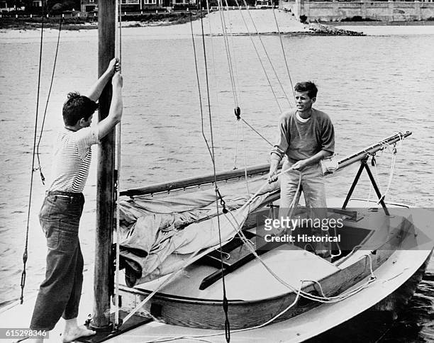 Ted and John F. Kennedy on a sailboat at Hyannisport, Massachusetts.