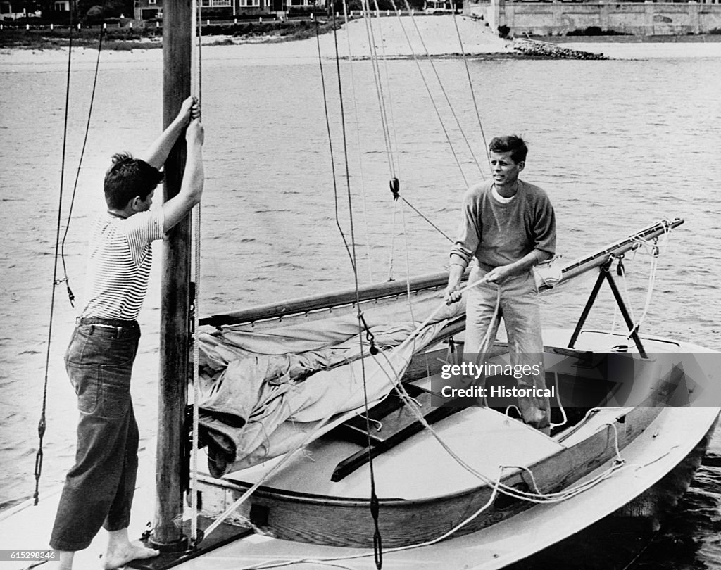 Ted and John F. Kennedy on a sailboat at Hyannisport, Massachusetts.