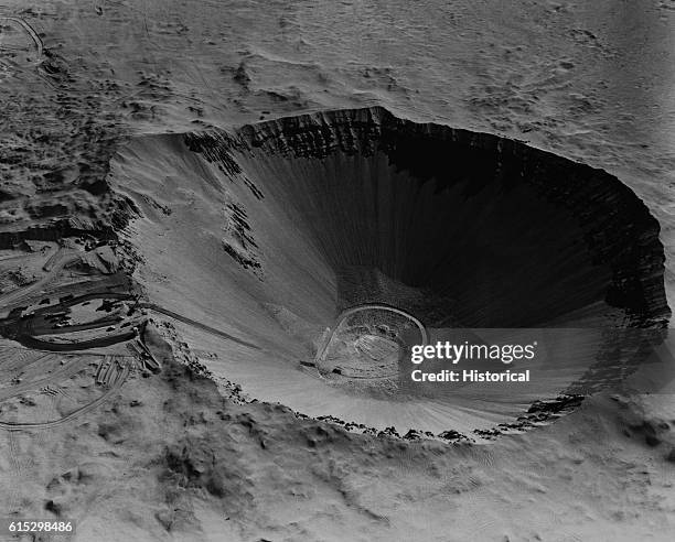 The Sedan Crater, more than the length of three football fields wide and one football field deep, was produced by a 100-kiloton thermonuclear...