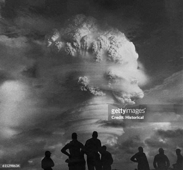 Soldiers watch the Operation Hardtack I thermonuclear detonation in 1958. | Location: Near Marshall Islands, Trust Territory of the Pacific Islands.