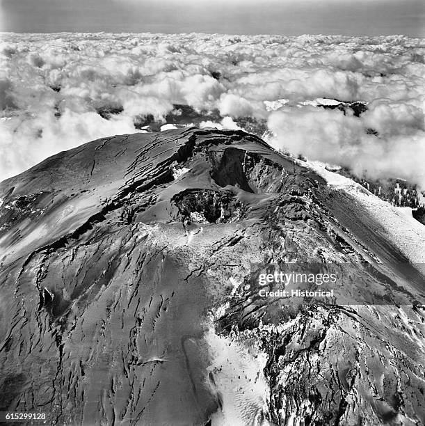 Mount St. Helens prior to its violent eruption on May 18, 1980. Often referred to as "the ice cream cone in the sky," becuase of its perfect cone...