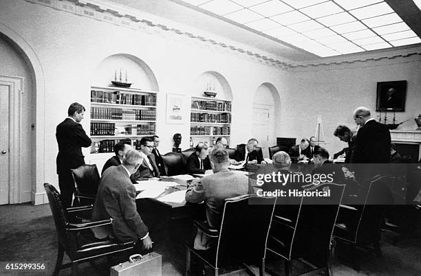 The Executive Committee of the National Security Council meets in the cabinet room during the Cuban Missile Crisis.